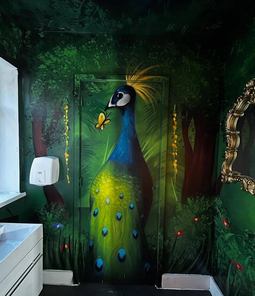 Immersive forest interior mural at Scoffs Leeds